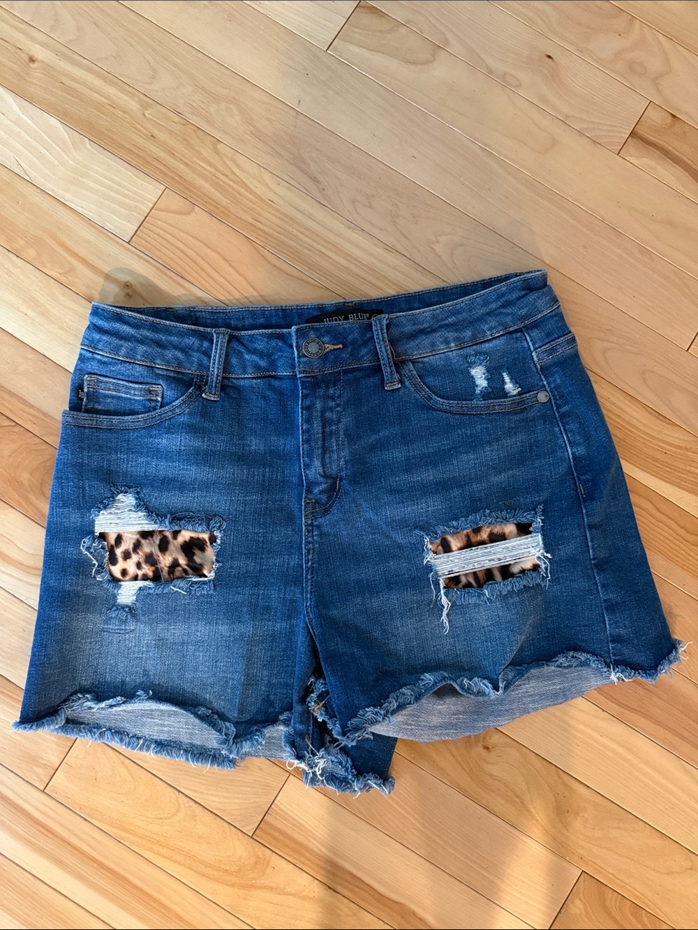 Judy Blue Blue Denim Shorts with Leopard Patch Cutouts
